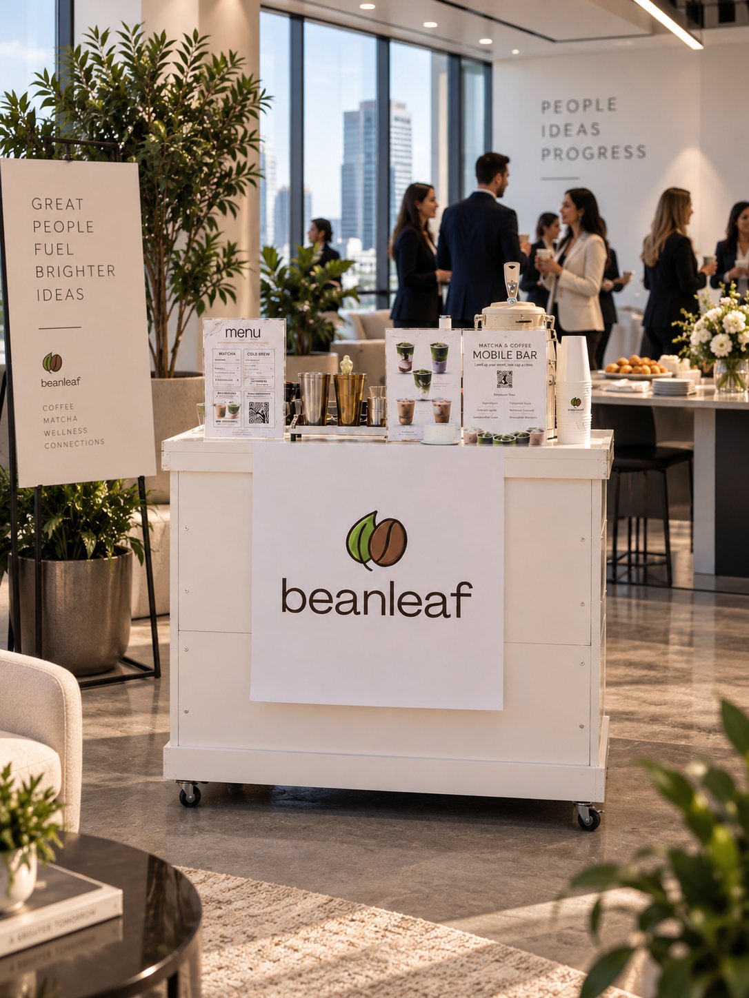 Beanleaf bar with branded signage at a networking event in a bright office lounge